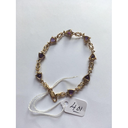 401 - An amethyst set 14ct gold bracelet 8g inc