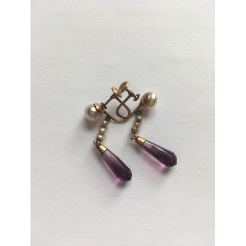 404 - A pair of vintage pearl and purple stone drop earrings in 9ct