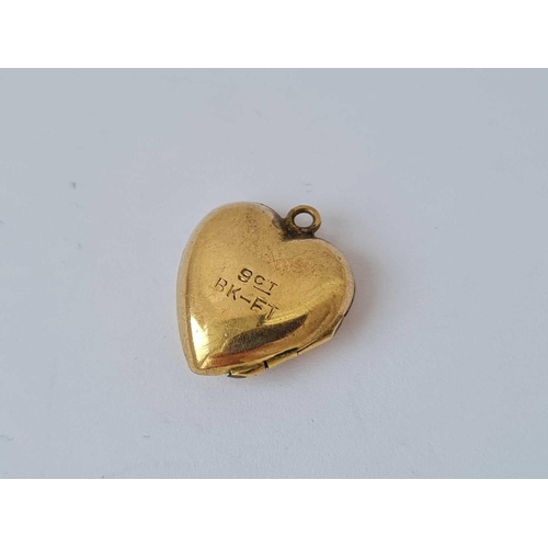 416 - A back and front heart shaped locket 9ct   1.6 gms