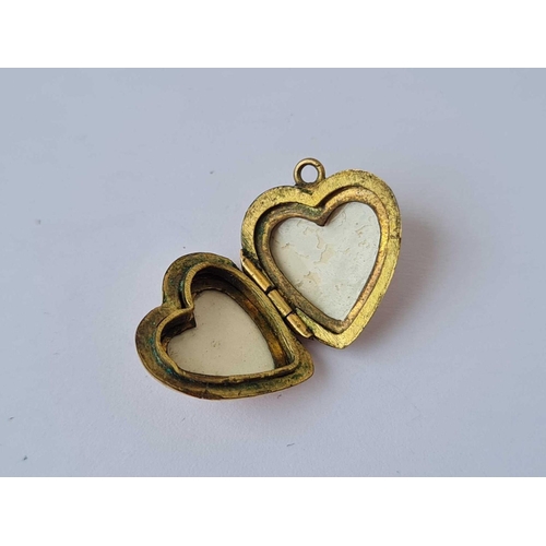 416 - A back and front heart shaped locket 9ct   1.6 gms