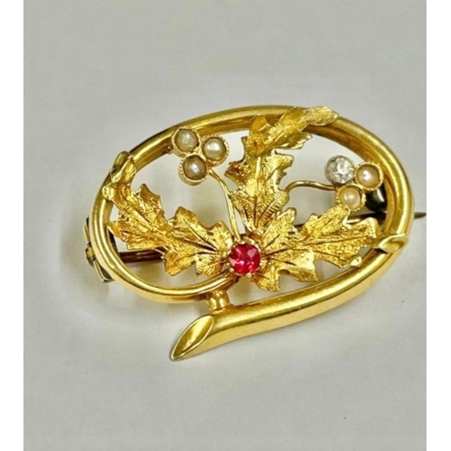 440 - A pearl and red stone floral brooch set in high carat gold    2.3 gms