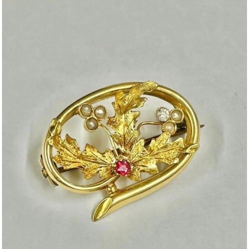 440 - A pearl and red stone floral brooch set in high carat gold    2.3 gms