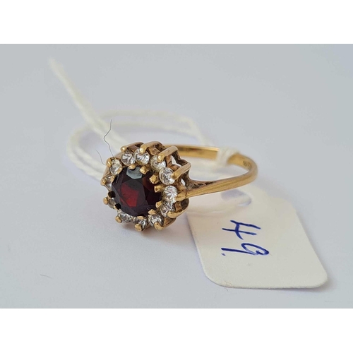 49 - A garnet and white stone ring 9ct size N   2.3 gms