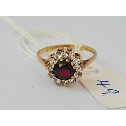 49 - A garnet and white stone ring 9ct size N   2.3 gms