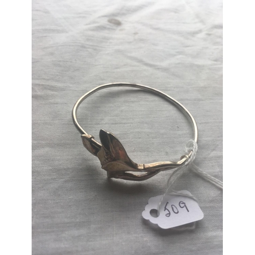 509 - A silver decorative floral expanding bangle by C&CC