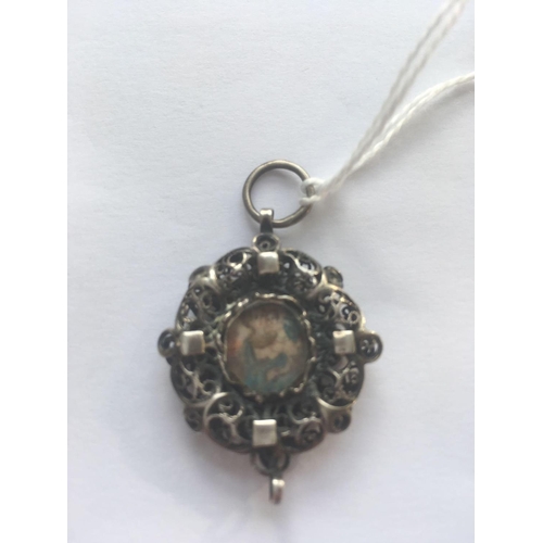 523 - A 18th century memorial silver pendant with a painted miniature scene to each side one poss of King ... 