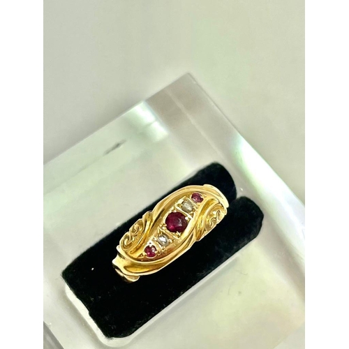 552 - A high carat gold diamond and ruby gypsy set five stone ring size J    1.4 gms