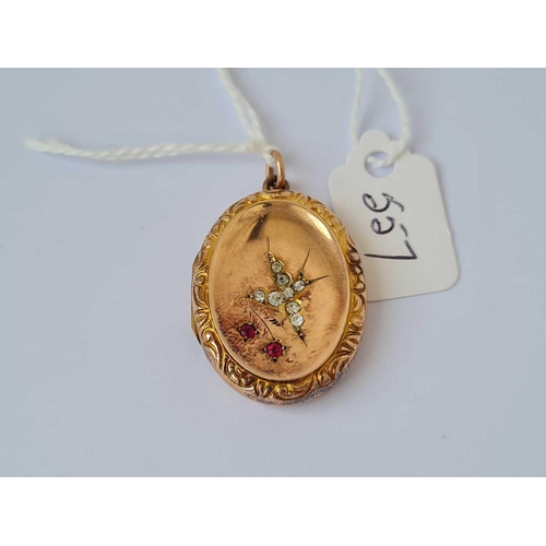 557 - A Victorian locket with paste set swallow design 9ct