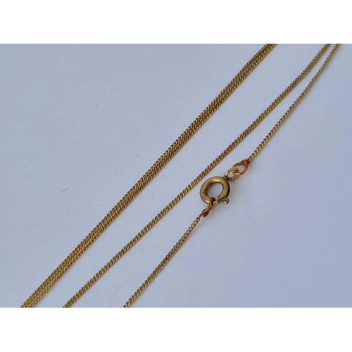 573 - A fine link neck chain 9ct