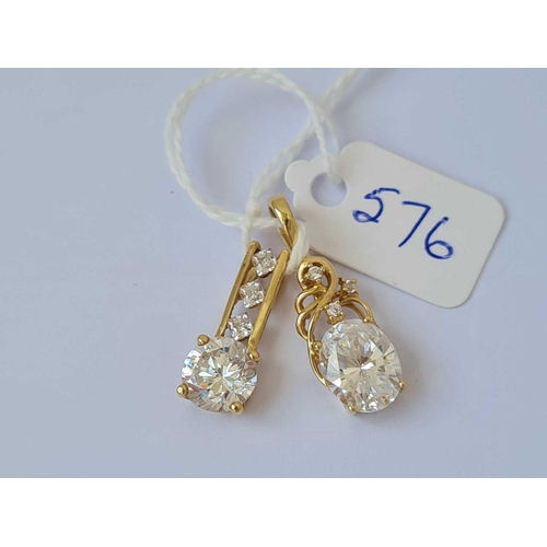 576 - Two white stone pendant 14ct gold   4.3 gms