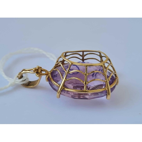 578 - A large amethyst pendant 9ct   8.7 gms