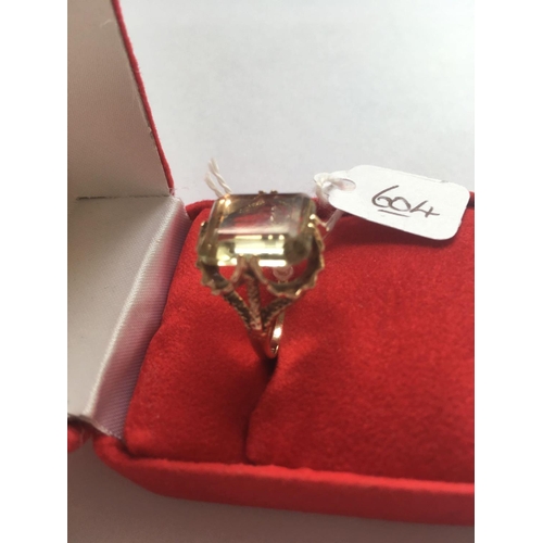 604 - A citrine dress ring in 9ct mount size J 5.2g inc