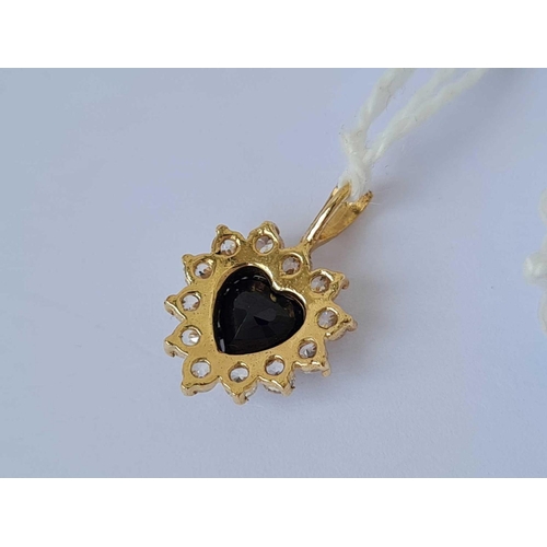 617 - A heart shaped pendant with sapphire 9ct    1.5 gms