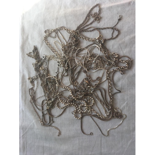 650 - Twenty two silver chains     104 gms