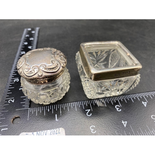 682 - An embossed silver top jar, Birmingham 1899 and a Chester silver mounted salt, 1922