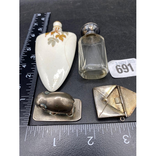 691 - An enamel and silver top scent bottle, a porcelain Urn shaped scent bottle, a stamp envelope and a m... 