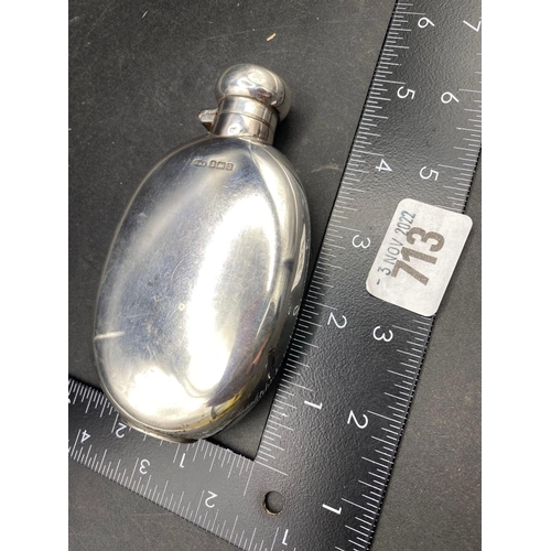 713 - An Edwardian oval flask of curved outline, bayonet cover, 4.5