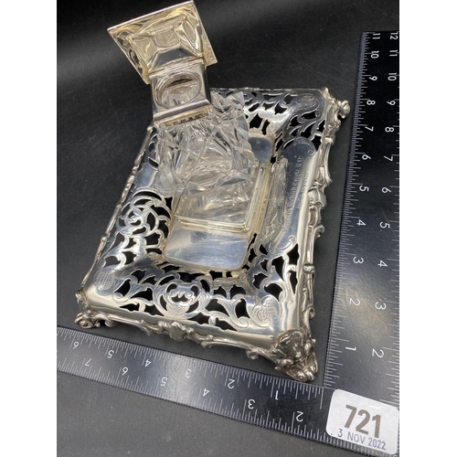 721 - An attractive early Victorian ink stand with pierced decoration and glass mounted ink pot, 7.5