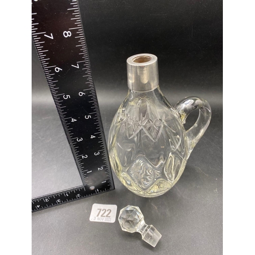 722 - A silver mounted decanter with cut glass body, 7