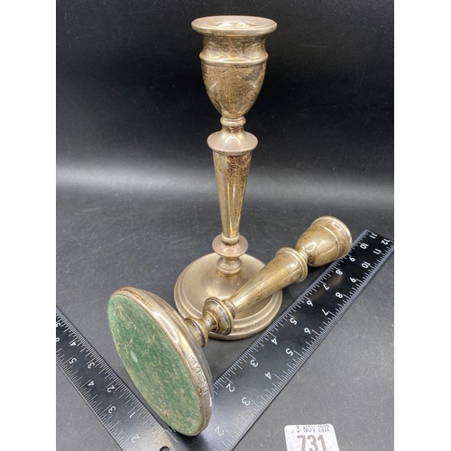 731 - A pair of candlesticks with circular bases and V shaped stems, 5