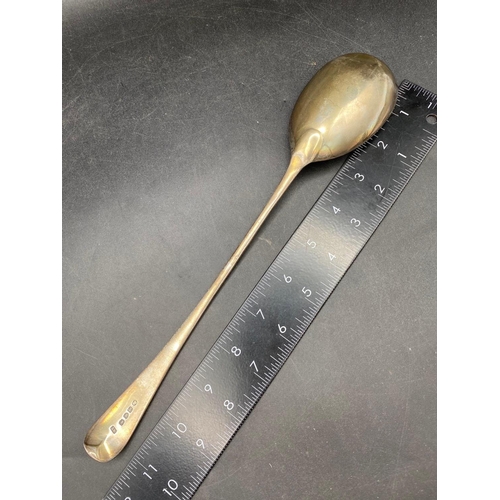 741 - A George III serving spoon with feather edge border and oval bowl, London 1814 by RT, 88g