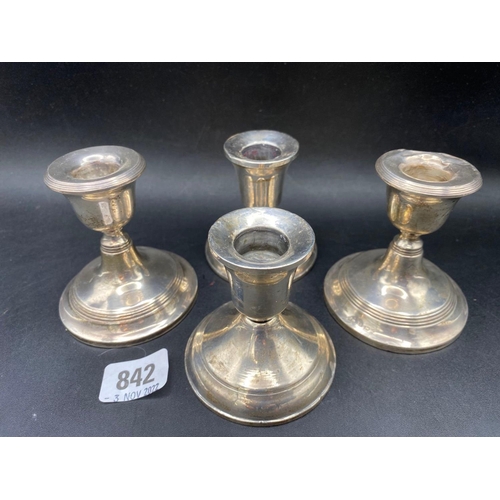 842 - Two pairs of piano candlesticks with reeded rims 3 inch high