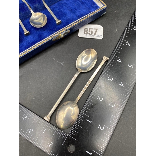 857 - A boxed set of six nail top coffee spoons, London 1929