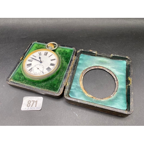 871 - A watch case with circular aperture and an eight day metal cased watch