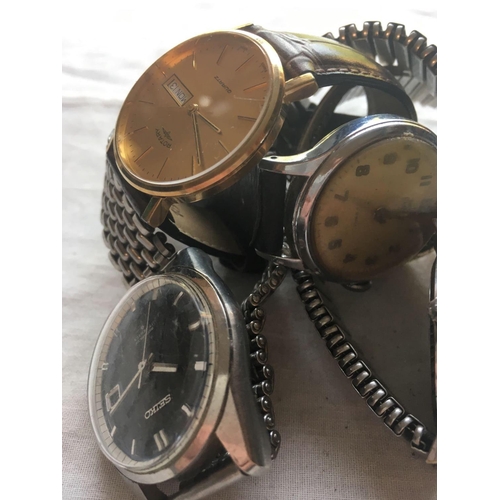 950 - Five assorted wrist watches