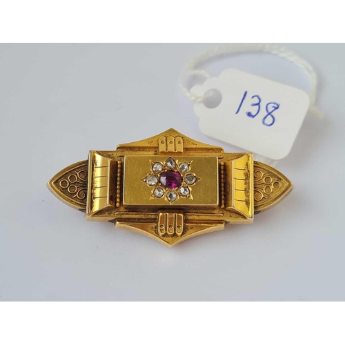 138 - A brooch with ruby and diamonds 15ct gold   6.4 gms