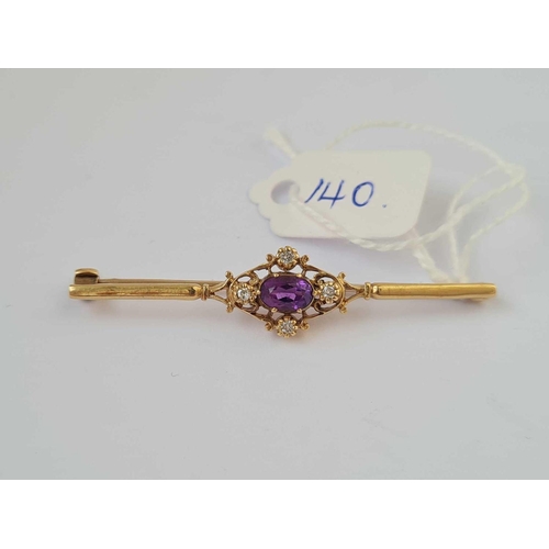 140 - A diamond and amethyst brooch 9ct   3 gms