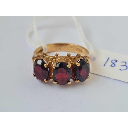 183 - A three stone garnet ring 9ct size P   4.3 gms