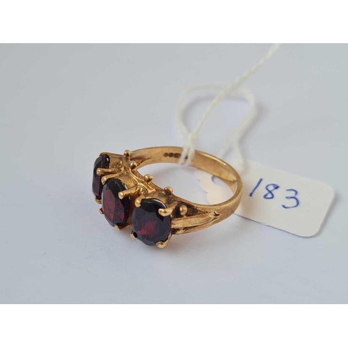 183 - A three stone garnet ring 9ct size P   4.3 gms