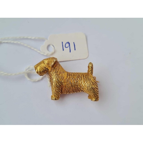 191 - A silver gilt dog brooch