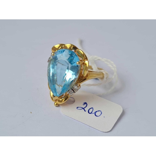 200 - A TOPAZ AND DIAMOND DRESS RING 14CT GOLD  8.3 GMS