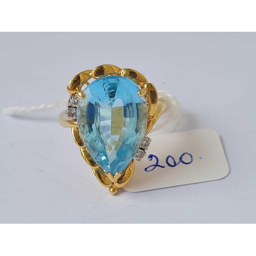 200 - A TOPAZ AND DIAMOND DRESS RING 14CT GOLD  8.3 GMS