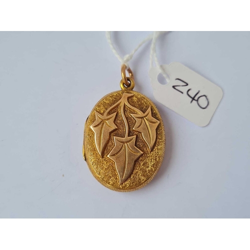 240 - A OVAL LOCKET WITH IVY LEAF DESIGN 15CT GOLD    8 GMS