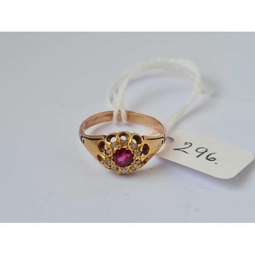 296 - A ruby and diamond cluster ring 18ct gold size O    3.2 gms