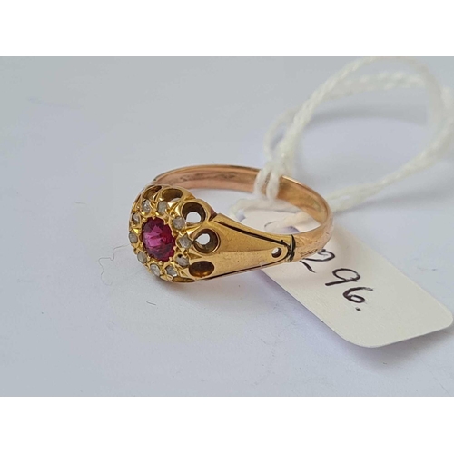 296 - A ruby and diamond cluster ring 18ct gold size O    3.2 gms