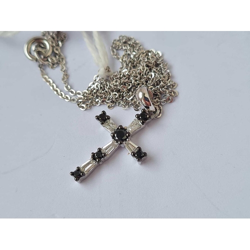 352 - A diamond cross on white gold chain all 18ct gold    2.7 gms