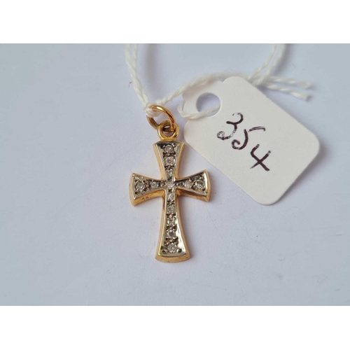 354 - A cross pendant with a diamond 9ct   1.6 gms