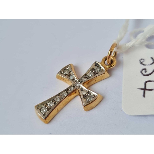 354 - A cross pendant with a diamond 9ct   1.6 gms