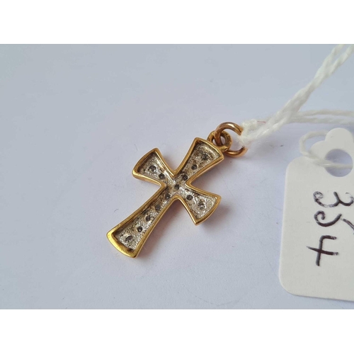 354 - A cross pendant with a diamond 9ct   1.6 gms