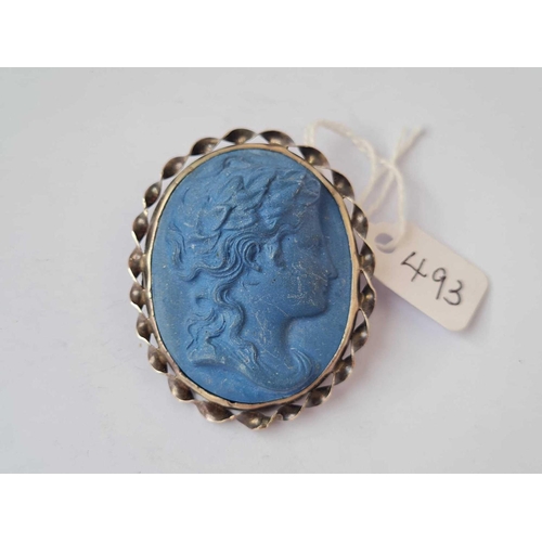 493 - A blue stone cameo set silver brooch