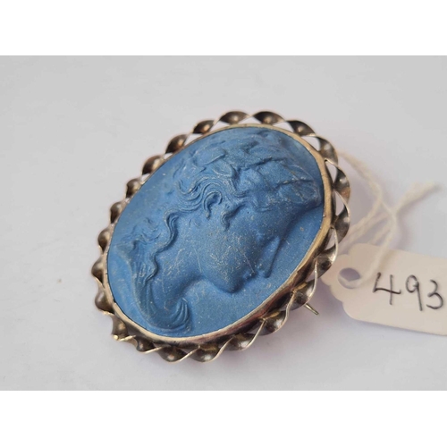 493 - A blue stone cameo set silver brooch