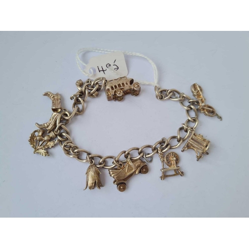 495 - A silver charm bracelet