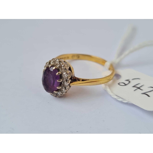 542 - A amethyst and diamond ring 18ct gold size Q    4.1 gms