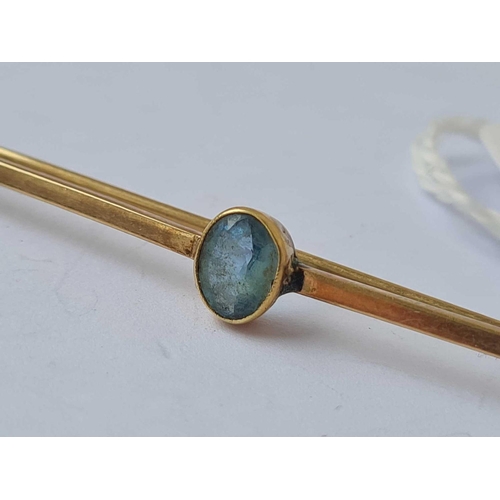 582 - A gold and blue stone brooch   2.6 gms