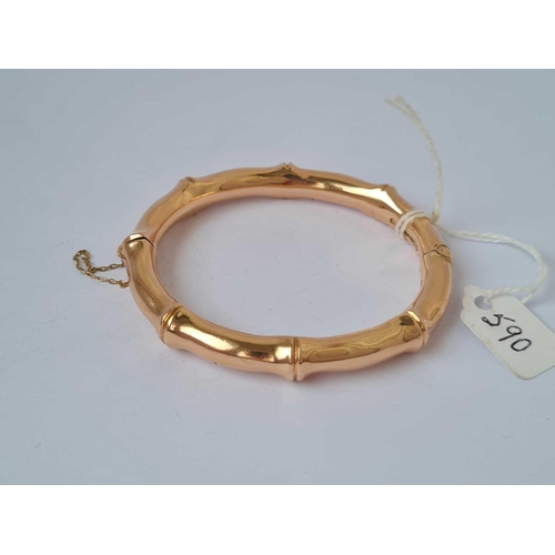 590 - A SIMULATED BAMBOO STYLE BANGLE 9CT   19.9 GMS