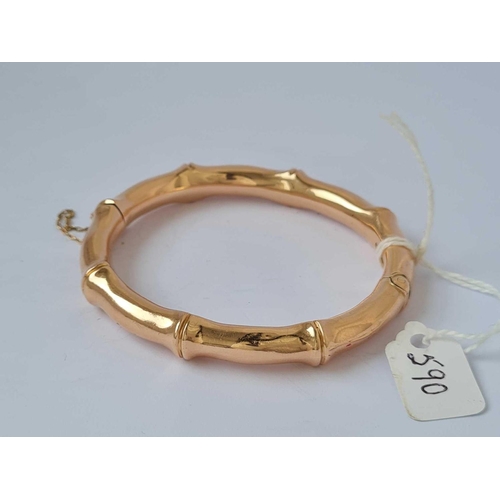 590 - A SIMULATED BAMBOO STYLE BANGLE 9CT   19.9 GMS